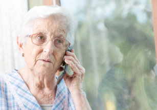 senior woman calling to the phone